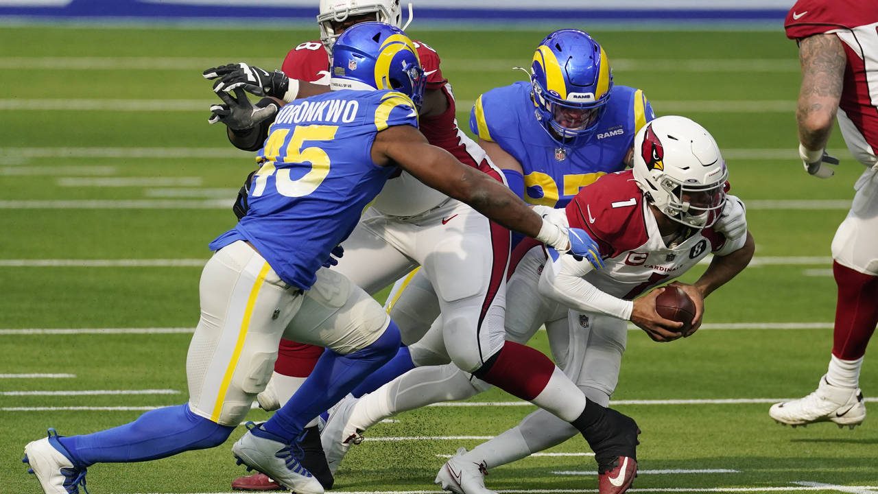 Arizona Cardinals quarterback Kyler Murray (1) is sacked by Los Angeles Rams defensive end Morgan F...