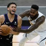Phoenix Suns forward Abdel Nader (11) is fouled by Denver Nuggets forward JaMychal Green during the second half of an NBA basketball game Saturday, Jan. 23, 2021, in Phoenix. (AP Photo/Rick Scuteri)