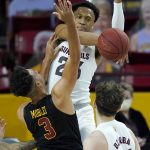USC forward Isaiah Mobley (3) has his shot blocked by Arizona State forward Marcus Bagley, middle, as Arizona State forward Pavlo Dziuba, right, looks on during the first half of an NCAA men's college basketball game Saturday, Jan. 9, 2021, in Tempe, Ariz. (AP Photo/Ross D. Franklin)