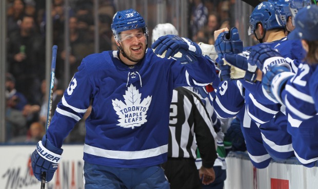 Frederik Gauthier #33 of the Toronto Maple Leafs celebrates a goal against the Vancouver Canucks du...