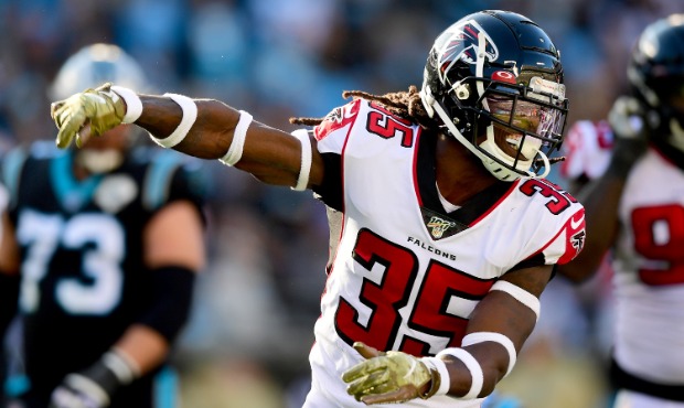 Jamal Carter #35 of the Atlanta Falcons reacts after a defensive play during the third quarter duri...