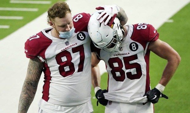 Arizona Cardinals tight end Maxx Williams (87) and tight end Dan Arnold (85) walk off the field aft...