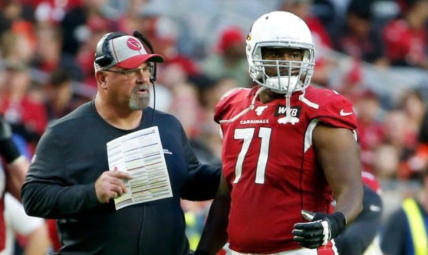Offensive lineman Justin Murray #71 of the Arizona Cardinals with offensive line coach Sean Kugler ...