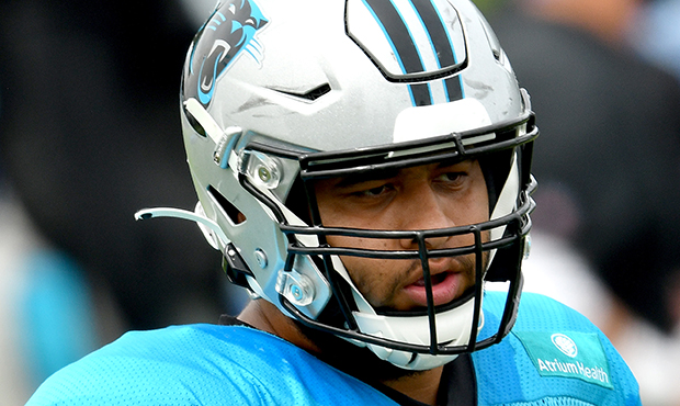 Branden Bowen #60 of the Carolina Panthers waits for his turn during a training camp session at Ban...