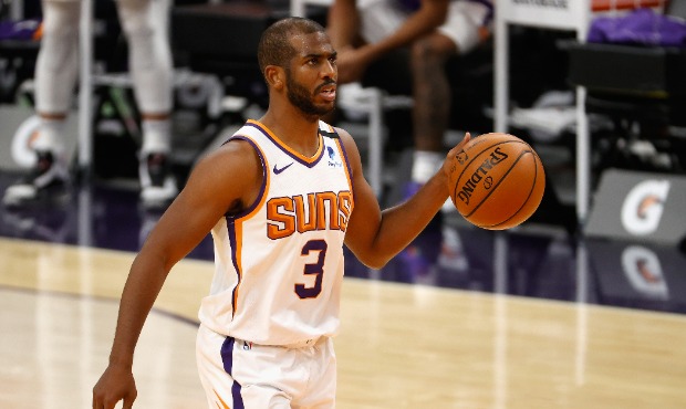 Chris Paul #3 of the Phoenix Suns handles the ball during the second half of the NBA game against t...