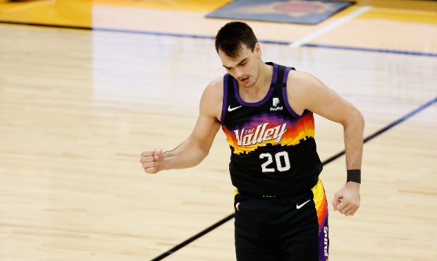 Dario Saric #20 of the Phoenix Suns celebrates a three-point shot against the Philadelphia 76ers du...