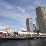 Tampa Bay Buccaneers fans line the Riverwalk as Tampa Bay Buccaneers players, family and friends celebrate their Super Bowl 55 victory over the Kansas City Chiefs with a boat parade in Tampa, Fla., Wednesday, Feb. 10, 2021. (Dirk Shadd/Tampa Bay Times via AP