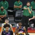 Boston Celtics head coach Brad Stevens calls out to an official during the second half of an NBA basketball game against the Phoenix Suns, Sunday, Feb. 7, 2021, in Phoenix. (AP Photo/Ralph Freso)