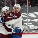 Colorado Avalanche right wing Mikko Rantanen (96) celebrates his goal against the Arizona Coyotes with center Nazem Kadri during the second period of an NHL hockey game Friday, Feb. 26, 2021, in Glendale, Ariz. (AP Photo/Ross D. Franklin)