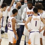 Phoenix Suns coach Monty Williams talks to his team during a timeout against the Portland Trail Blazers during the second half of an NBA basketball game Monday, Feb. 22, 2021, in Phoenix. (AP Photo/Darryl Webb)