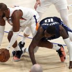 Phoenix Suns guard Chris Paul (3) grabs the ball away from Dallas Mavericks forward Dorian Finney-Smith (10) in the second half during an NBA basketball game, Monday, Feb. 1, 2021, in Dallas. (AP Photo/Richard W. Rodriguez)
