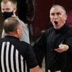 Arizona State coach Bobby Hurley talks with a referee during the first half of the team's NCAA college basketball game against Washington State, Saturday, Feb. 27, 2021, in Tempe, Ariz. (AP Photo/Rick Scuteri)