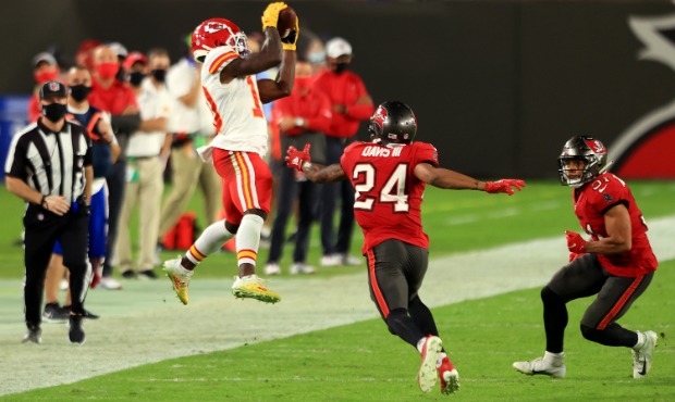 Tyreek Hill #10 of the Kansas City Chiefs makes a catch against Carlton Davis #24 of the Tampa Bay ...