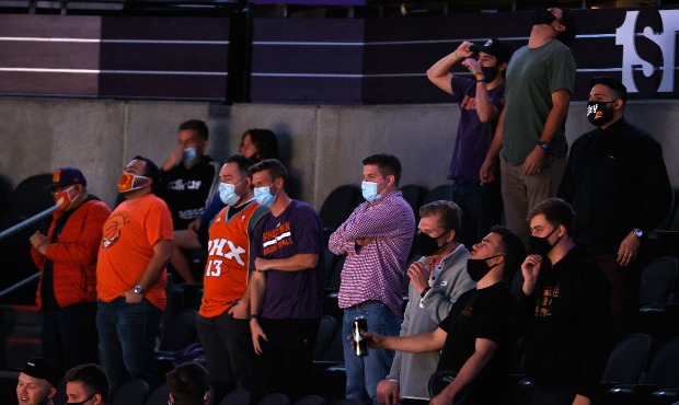 Fans are seen in attendance during the second half of the NBA game between the Phoenix Suns and the...