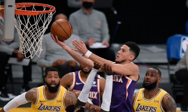 March: Suns’ Devin Booker ejected vs. Lakers after questionable double-technical (Photo by Harry ...
