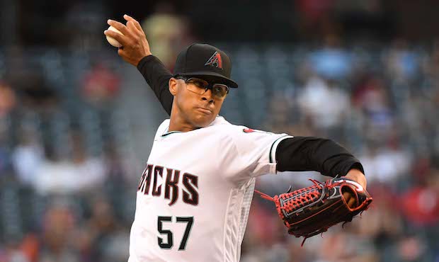 Jon Duplantier #57 of the Arizona Diamondbacks delivers a first inning pitch against the New York M...