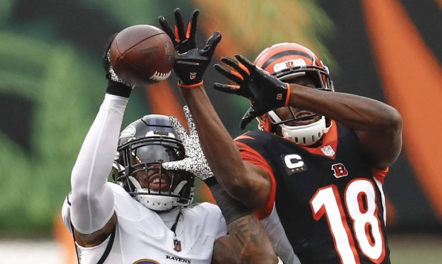 Baltimore Ravens strong safety Chuck Clark (36) breaks up a pass intended for Cincinnati Bengals wi...