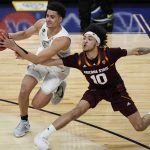 Oregon's Will Richardson (0) drives around Arizona State's Jaelen House (10) during the second half of an NCAA college basketball game in the quarterfinal round of the Pac-12 men's tournament Thursday, March 11, 2021, in Las Vegas. (AP Photo/John Locher)