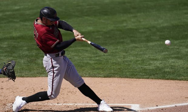 Arizona Diamondbacks' Tim Locastro doubles during the second inning of a spring training baseball g...