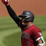 Arizona Diamondbacks' Ketel Marte (4) celebrates after hitting a home run during the first inning of a spring training baseball game against the Oakland Athletics Tuesday, March 16, 2021, in Scottdale, Ariz. (AP Photo/Ashley Landis)