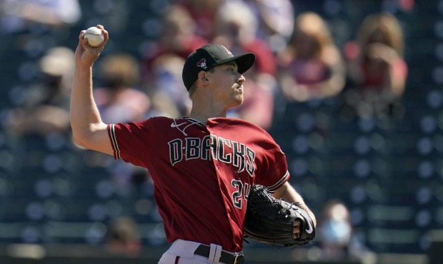 Arizona Diamondbacks starting pitcher Luke Weaver throws a pitch against the Cleveland Indians duri...