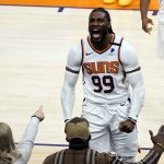 Phoenix Suns forward Jae Crowder (99) acknowledges the fans after scoring against the Atlanta Hawks during the second half of an NBA basketball game, Tuesday, March 30, 2021, in Phoenix. Phoenix won 117-110. (AP Photo/Rick Scuteri)
