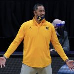 Michigan head coach Juwan Howard reacts to a call during the second half of an Elite 8 game against UCLA in the NCAA men's college basketball tournament at Lucas Oil Stadium, Tuesday, March 30, 2021, in Indianapolis. (AP Photo/Michael Conroy)
