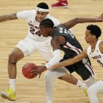 Arizona State's Jalen Graham, left, and Alonzo Verge Jr., right, guard Washington State's Noah Williams (24) during the first half of an NCAA college basketball game in the first round of the Pac-12 men's tournament Wednesday, March 10, 2021, in Las Vegas. (AP Photo/John Locher)