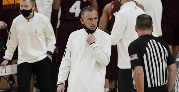Arizona State head coach Bobby Hurley speaks with an official during the first half of an NCAA coll...
