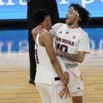 Arizona State's Alonzo Verge Jr., left, and Jaelen House celebrate as they lead Washington State with seconds left during the second half of an NCAA college basketball game in the first round of the Pac-12 men's tournament Wednesday, March 10, 2021, in Las Vegas. (AP Photo/John Locher)