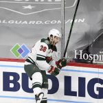 Minnesota Wild's Ryan Hartman (38) celebrates his goal against the Arizona Coyotes during the first period of an NHL hockey game Tuesday, March 16, 2021, in St. Paul, Minn. (AP Photo/Hannah Foslien)