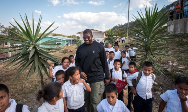 A 2016 photo of Kelvin Beachum, Jr. with students from World
Vision's Agua Blanca project and peer
...