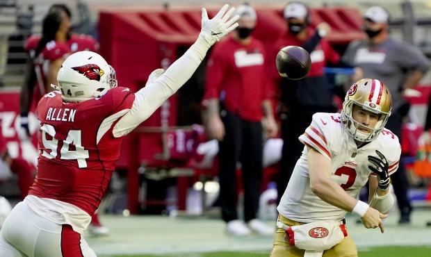 San Francisco 49ers quarterback C.J. Beathard (3) looks to pass as Arizona Cardinals defensive end ...