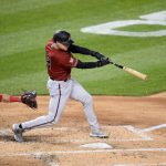 Andrew Young #15 of the Arizona Diamondbacks hits a grand slam in the second inning against the Washington Nationals at Nationals Park on April 15, 2021 in Washington, DC. All players are wearing the number 42 in honor of Jackie Robinson Day. (Photo by Greg Fiume/Getty Images)