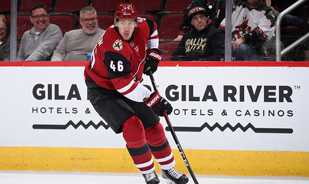 Ilya Lyubushkin #46 of the Arizona Coyotes skates with the puck during the third period of the NHL ...
