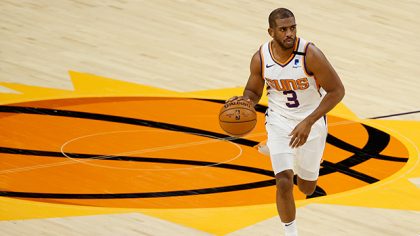 PHOENIX, ARIZONA - MARCH 30: Chris Paul #3 of the Phoenix Suns handles the ball during the NBA game...