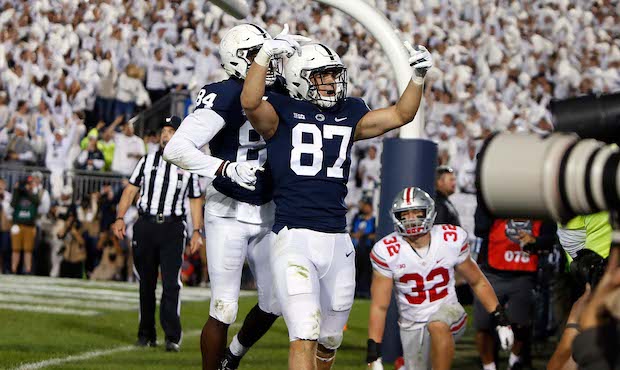 Pat Freiermuth #87 of the Penn State Nittany Lions celebrates after catching a 2 yard touchdown pas...