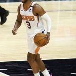 Phoenix Suns guard Chris Paul yells out instructions as he dribbles during the first half of an NBA basketball game against the Los Angeles Clippers Thursday, April 8, 2021, in Los Angeles. (AP Photo/Marcio Jose Sanchez)