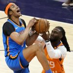 
              Phoenix Suns forward Jae Crowder (99) strips the ball from Oklahoma City Thunder center Moses Brown during the first half of an NBA basketball game, Friday, April 2, 2021, in Phoenix. (AP Photo/Rick Scuteri)
            