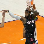 Houston Rockets guard Armoni Brooks (1) passes against the Phoenix Suns during the second half of an NBA basketball game, Monday, April 12, 2021, in Phoenix. (AP Photo/Matt York)