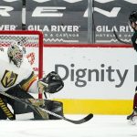Vegas Golden Knights goaltender Robin Lehner, left, makes a save on a shot by Arizona Coyotes center Derick Brassard (16) during the second period of an NHL hockey game Friday, April 30, 2021, in Glendale, Ariz. (AP Photo/Ross D. Franklin)