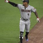 Arizona Diamondbacks' Ketel Marte points into the dugout after hitting a two-run home run during the seventh inning of the team's baseball game against the San Diego Padres on Friday, April 2, 2021, in San Diego. (AP Photo/Denis Poroy)