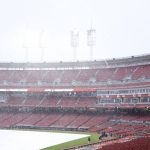 
              Members of the grounds crew tend to the field as snow falls prior to the continuation of a baseball game between the Arizona Diamondbacks and the Cincinnati Reds in Cincinnati, Wednesday, April 21, 2021. The game was suspended in the eighth inning the day before due to weather. (AP Photo/Aaron Doster)
            