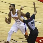 Phoenix Suns forward Mikal Bridges (25) reacts after making a basket against the Houston Rockets during the first quarter of an NBA basketball game in Houston, Monday, April 5, 2021. (Troy Taormina/Pool Photo via AP)