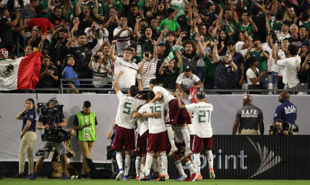 Diego Reyes #5, Hector Moreno #15, Carlos Salcedo #3 and Luis Rodriguez #21 of Mexico celebrate wit...
