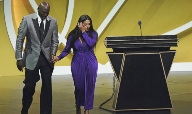 Presenter Michael Jordan, left, escorts Vanessa Bryant off the stage after Bryant's late husband, K...