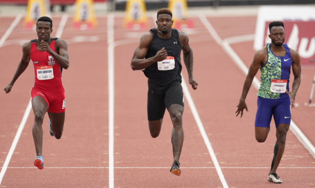 Seattle Seahawks wide receiver DK Metcalf, center, competes in the second heat of the men's 100-met...