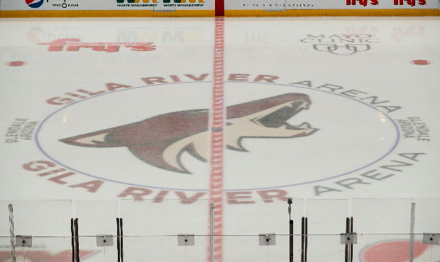 The Coyotes logo on the ice during the NHL hockey game between the Chicago Blackhawks and the Arizo...
