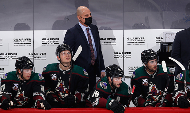 Head coach Rick Tocchet of the Arizona Coyotes watches from the bench during the first period of th...
