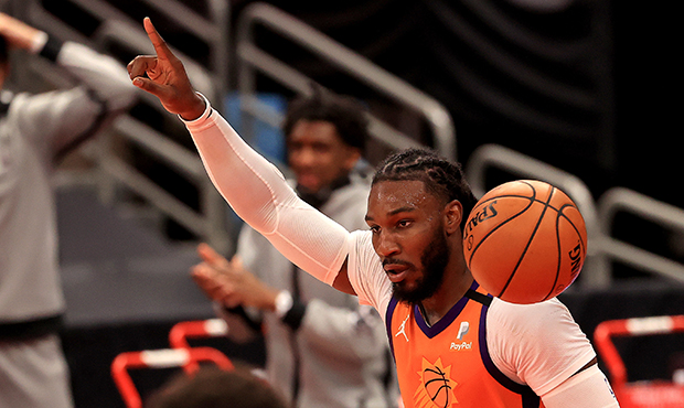 Jae Crowder #99 of the Phoenix Suns reacts to a play during a game against the Toronto Raptors at A...